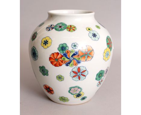 A CHINESE DOUCAI PORCELAIN JAR, decorated with scattered flowerheads, the base with a Qianlong seal mark, 6.3in wide at wides