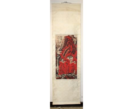 A CHINESE PAPER HANGING SCROLL PICTURE, depicting a predominantly red mountainous landscape scene, the picture itself 37.75in