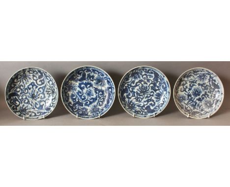 A GROUP OF FOUR CHINESE KANGXI PERIOD BLUE & WHITE SHIPWRECK PORCELAIN PLATES. (4)