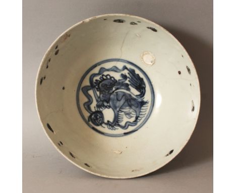 A LARGER CHINESE WANLI PERIOD BLUE & WHITE SHIPWRECK PORCELAIN BOWL, painted to its centre with a circular panel of a Buddhis