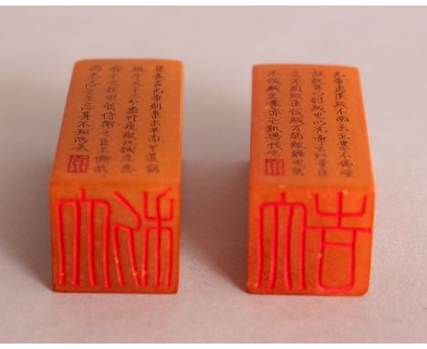 A PAIR OF CHINESE SOAPSTONE SEALS, together with a fitted box, each seal engraved with calligraphy, each seal 0.8in square & 