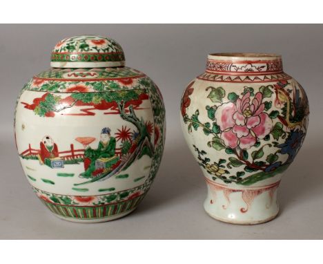 AN 18TH/19TH CENTURY CHINESE FAMILLE ROSE BALUSTER VASE, painted with a peacock perched on rockwork beside peony, 8.8in high;