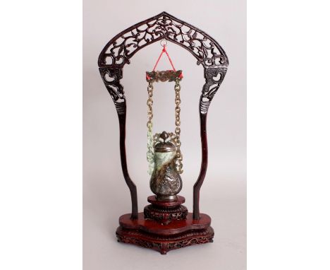 A GOOD 20TH CENTURY CHINESE HANGING JADE VASE & COVER, with wood hanging frame and stand and also a fitted box, the jade vase