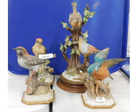 Four Capodimonte ceramic bird ornaments. (AF)