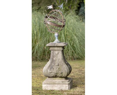 Sundials: A rare and early iron and copper armillary on carved stone pedestal, mid 18th century, 164cm high  Armillary sphere