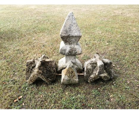 Gate piers: A pair of carved stone Gothic pier tops, 37cm wide, together with a carved stone architectural roof ridge finial 