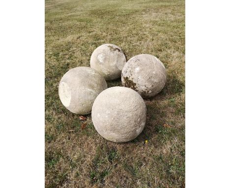 Gate piers: A set of four carved Cotswold stone gate pier balls, 33cm diameterThe Cotswold Collection.  See lot 1 for further