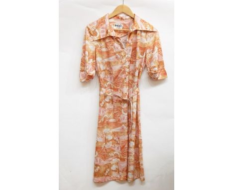 Early 1970's shirt dress by Heygirl, London; a maxi dress with floral print with short puff sleeves and a belt, empire waist;