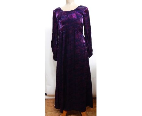 1960's maxi dress in a purple printed lame style material with elasticated cuffs to the sleeves and an empire waist; a black 