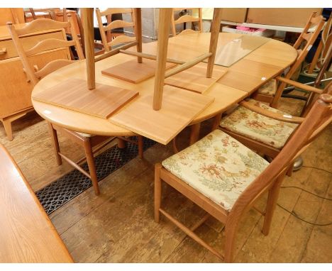 Light elm Ercol D-end extending dining table and six ladderback Ercol chairs with foliate upholstered seatsCondition Reportme