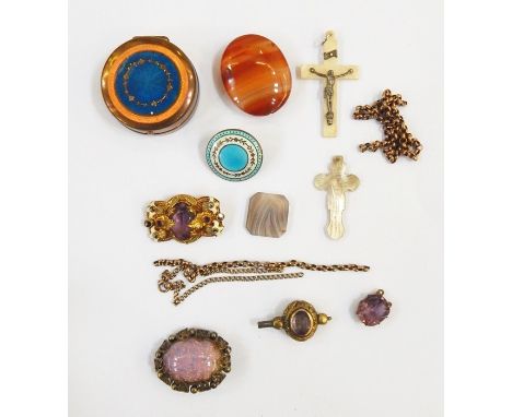 Loose stone cornelian, an enamel button, an enamel and brass-coloured powder puff, part of a gold chain, a gold-coloured meta