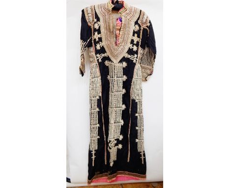 Middle Eastern robe/dress in black cotton, heavily embroidered with metal detail and cotton, gold-coloured metal on the cuffs