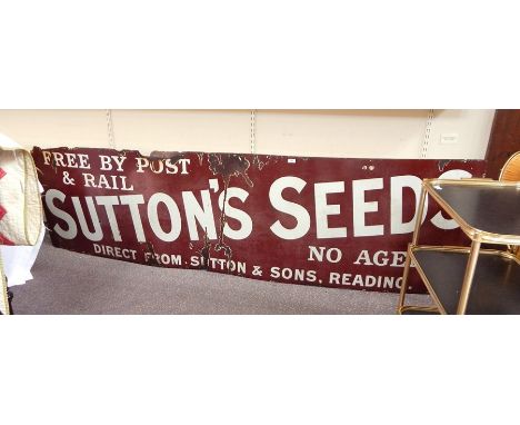 Enamel advertising sign&nbsp;for Sutton's Seeds, on a red ground with white lettering reading 'Free by Post and Rail Sutton's