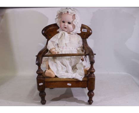 A bisque headed German doll impressed AS Germany 268/9 to rear of head, with five piece composite body. The doll has open blu