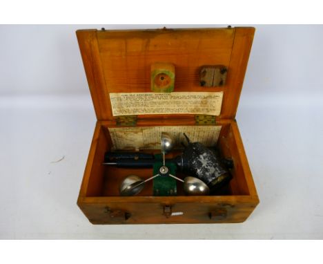 A vintage anemometer contained in pine case. [W]