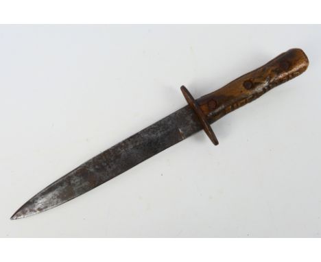 A World War Two (WW2 / WWII) Italian MVSN fighting knife, 20 cm (l) blade, oval crossguard and two piece wooden grips which h