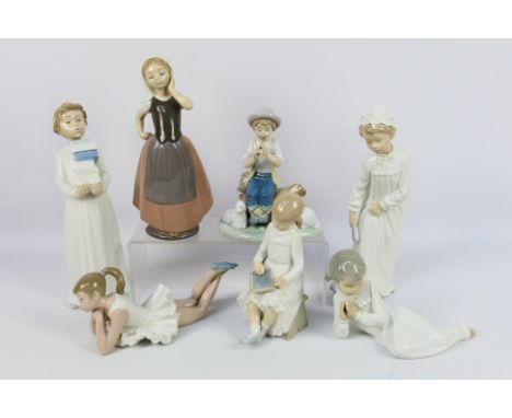 A quantity of Spanish porcelain figures by Nao, largest approximately 28 cm (h). [W]