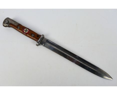 Imperial German S84/98 Bayonet, with two piece wooden grips, steel pommel and short cross guard, the cross guard stamped with