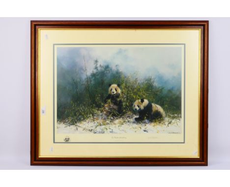 David Shepherd (1931 - 2017) - A limited edition print entitled The Pandas Of Wolong, depicting a pair of panda bears feastin