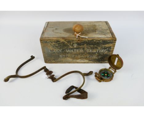 Lot to include a World War Two (WW2 / WWII) Case Water Testing Sterilization wooden box, pair of spurs and a brass cased marc