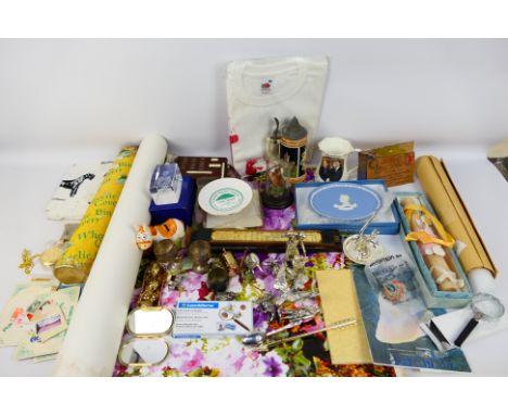 A mixed lot to include ceramics, vintage slide rule, white metal figures, stamps, Manchester United football match ticket stu