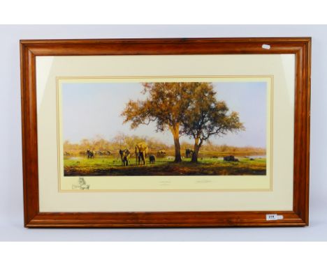 David Shepherd (1931 - 2017) - A limited edition print entitled Luangwa Evening, depicting elephants and other African fauna 