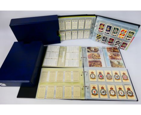 Trade Cards - A collection of military themed sets of cigarette and tea cards 1930's and later, organised into sets and house