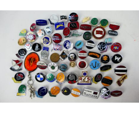 A good collection of enamel and similar pin badges, predominantly relating to motorcycle manufacturers and motorcycle racing 
