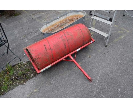 Roller attachment for a ride on mower