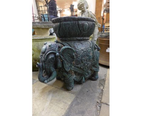 A figural elephant garden planter 