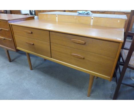 An Austin Suite teak sideboard 