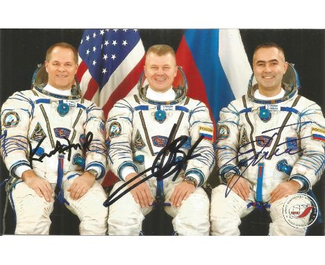 K. Ford American Soyuz Cosmonaut, O. Novitskiy Russian Soyuz Cosmonaut and E. Tarelkin Russian Soyuz Cosmonaut signed 6 x 4 c