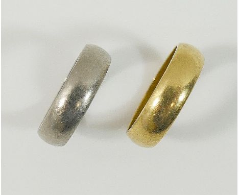 An 18ct white gold D-shaped wedding band, finger size P, 5mm wide, hallmark London 1977, and a matching yellow metal wedding 