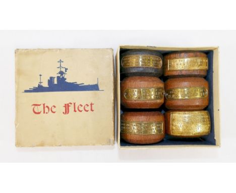 Six turned teak napkin rings made from the timber of assorted ships, each napkin ring with identifying inscribed brass plaque