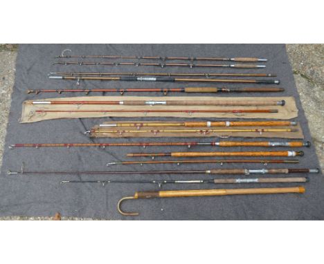 A collection of ten sea and boat fishing rods including a Hardy ‘Sidewinder’ No. 2 and another No.3, a Hardy split cane rod w