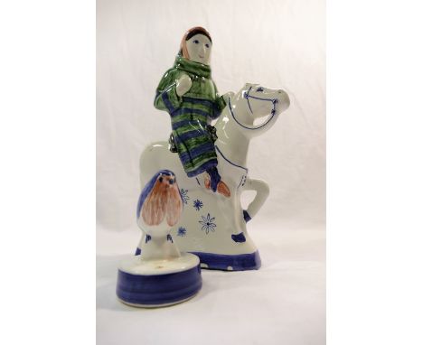 A collection of Iden and Rye Pottery items comprised of a Rye Pottery figure of a woman on a horse, 21.5cm high and a smaller