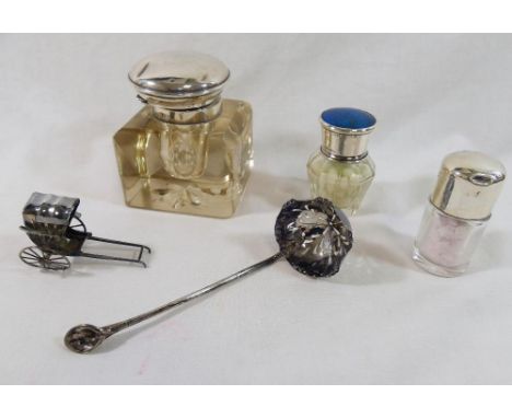 Two small glass toiletry jars with silver lids, one inlaid with butterfly wing, a square cut-glass inkwell with silver lid, a