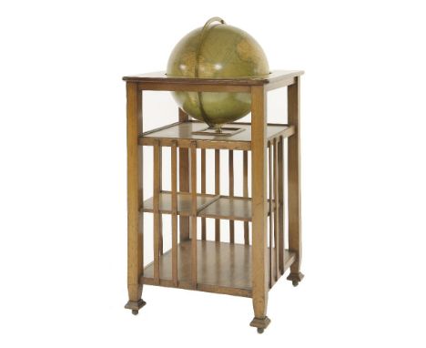 An Edwardian library globe,'The Merchant Shipper Globe', by Philips, 18th century, in a three-tier stand, fitted with a compa