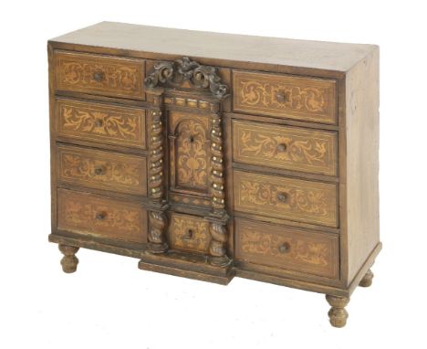 An Italian walnut inlaid table cabinet, centred with an architectural portico with two drawers, with locking mechanism for th