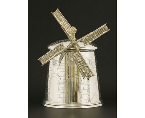 A novelty silver-plated windmill biscuit barrel,with a gilt finial of a sheaf of corn, and an engraved body with cast sails,2