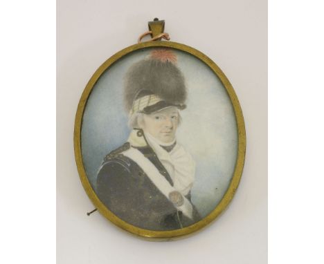 Circle of Thomas Clement Thompson RHA (1778-1857)PORTRAIT OF AN OFFICER, BUST LENGTH, IN A DARK BLUE UNIFORM AND A TALL FEATH
