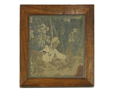 A tapestry panel fragment,18th century,37 x 33cm approximatelylater edged and in an oak frame 50.5 x 47cm