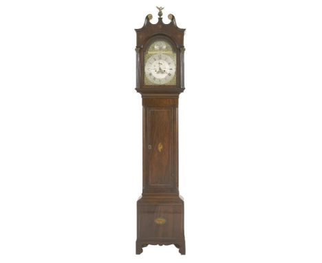 A mahogany longcase clock,with an arched brass dial and silvered chapter ring to the centre, inscribed 'John Moore, Warminste