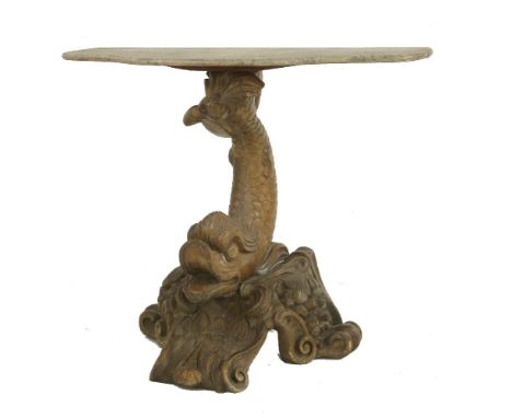 A carved pine and walnut console table, late 18th century, the serpentine top simulated marble, the base carved with a dolphi