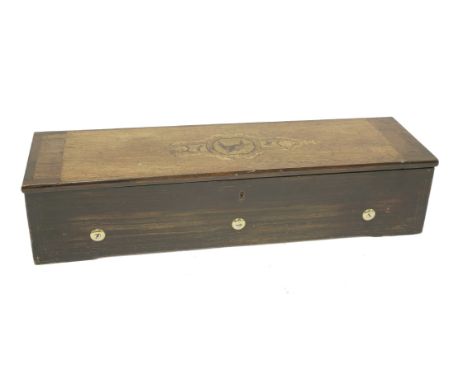 A Nicole Frères musical box,serial no. 33711, playing eight airs, twin combs, key wind spring mechanism, paper label 'Musique