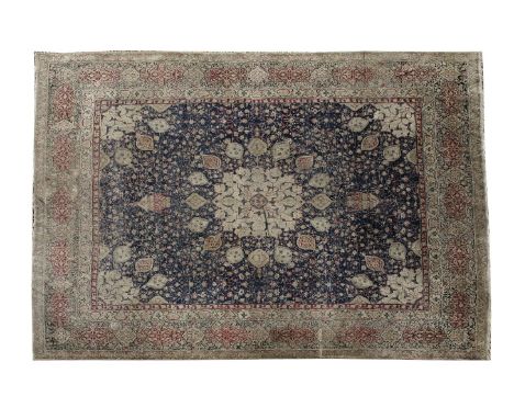 An Indian Agra carpet,late 19th century, of Ardabil design, 363 x 422cm