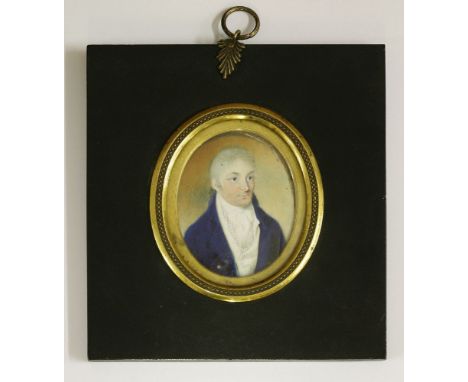 English School, late 19th centuryPORTRAIT OF A GENTLEMAN, HALF LENGTH, IN A BLUE COATMiniature on ivory, oval73 x 60mm;Englis