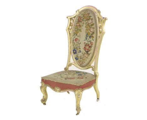 A Victorian gilt-framed side chair,with a high oval padded tapestry back and seat on moulded front legs and castorsProvenance