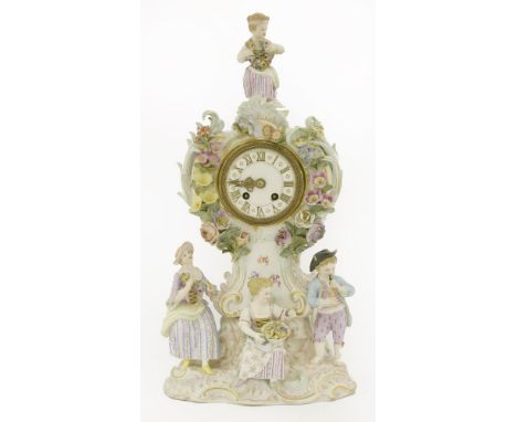 A Meissen porcelain figural mantel clock,c.1870, 'The Four Seasons', the dial with gilt Roman numerals, the French movement s