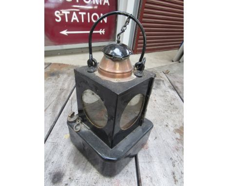 An LNER signal lamp interior with metal burner and copper chimney 